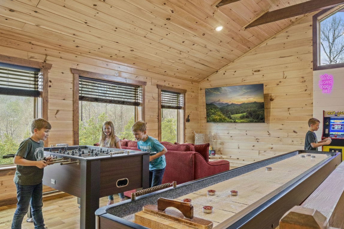 The game room has foosball, shuffleboad, and a multicade arcade