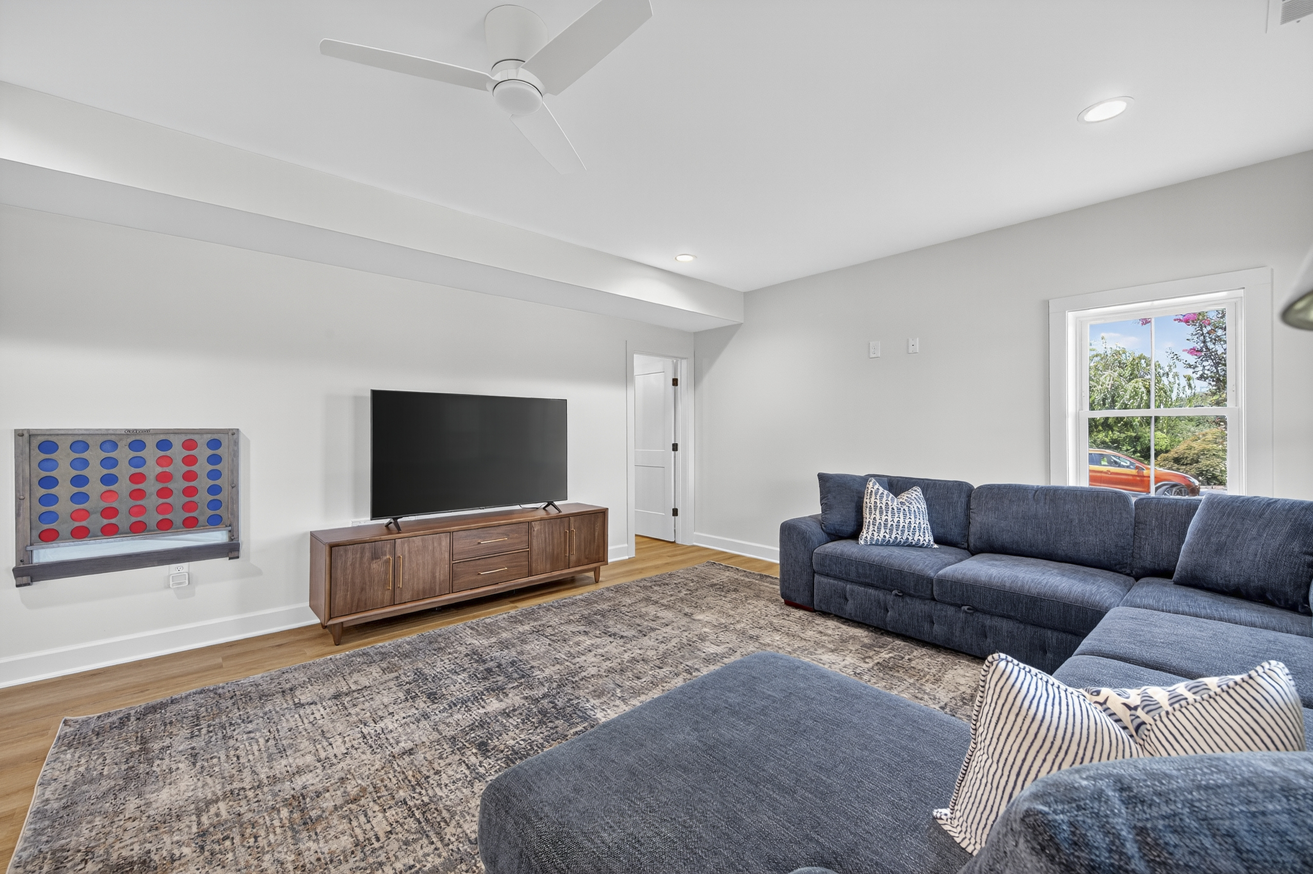 Spacious entertainment area with smart TV and enough room for the whole crew.