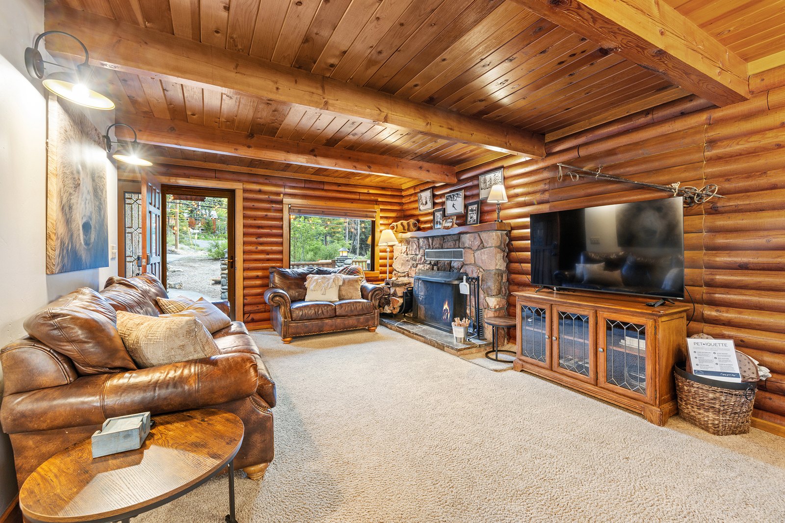 Throw open the doors to the deck and let inside and out become one big gathering space, fire crackling at the center.