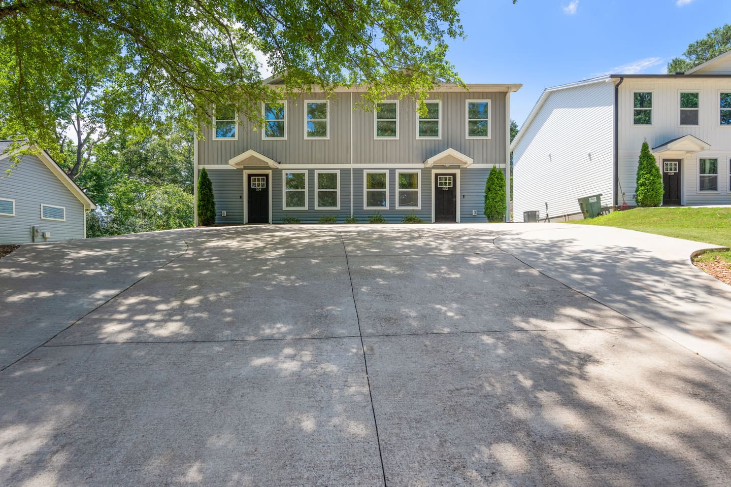 Full duplex view with driveway