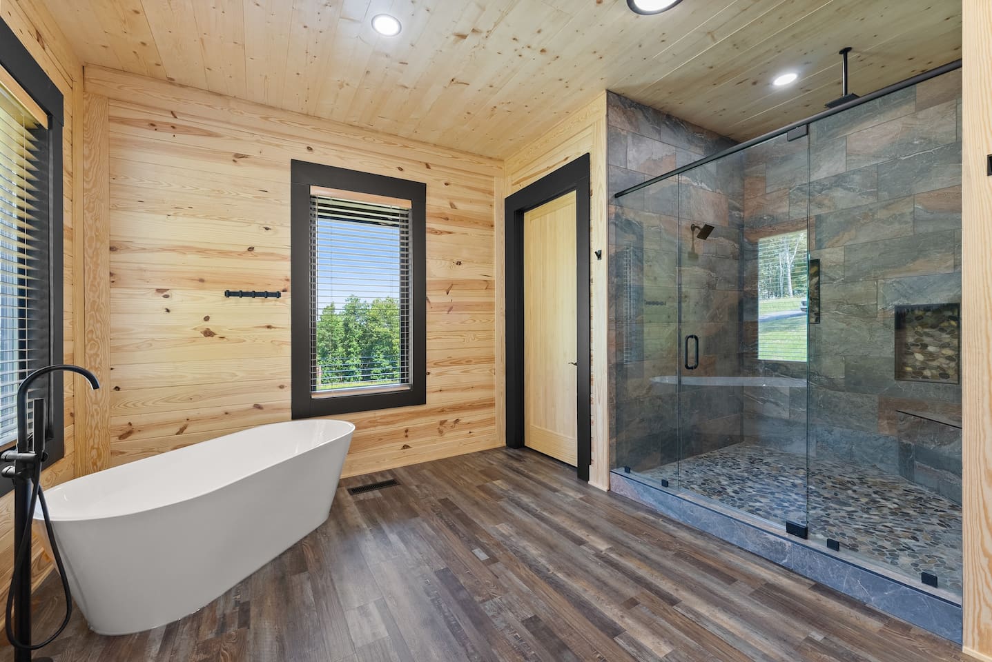 Natural light and outdoor scenery make this bathroom a refreshing escape every time you step in.