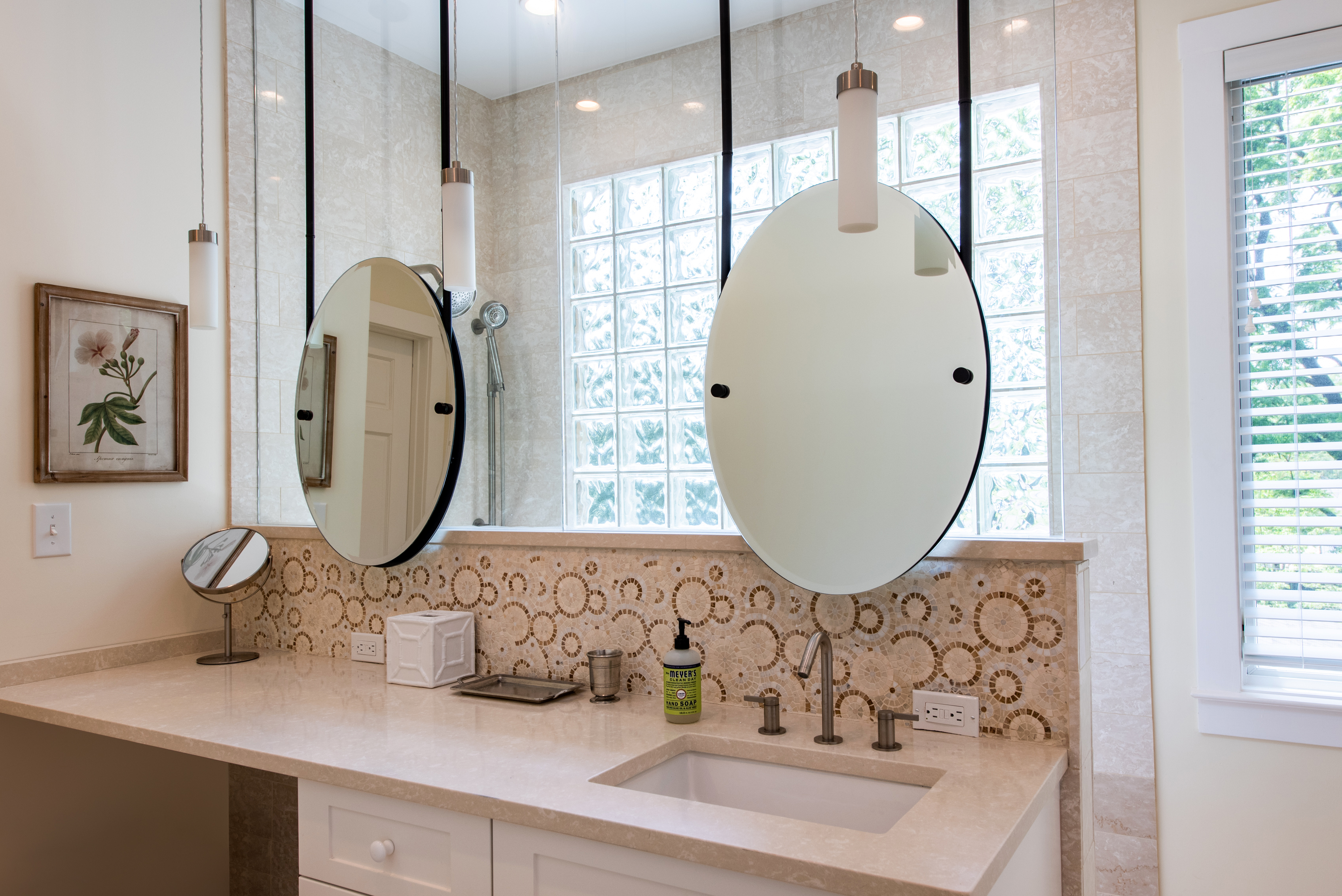 Modern dual sinks offer convenience and style for a functional bathroom space.