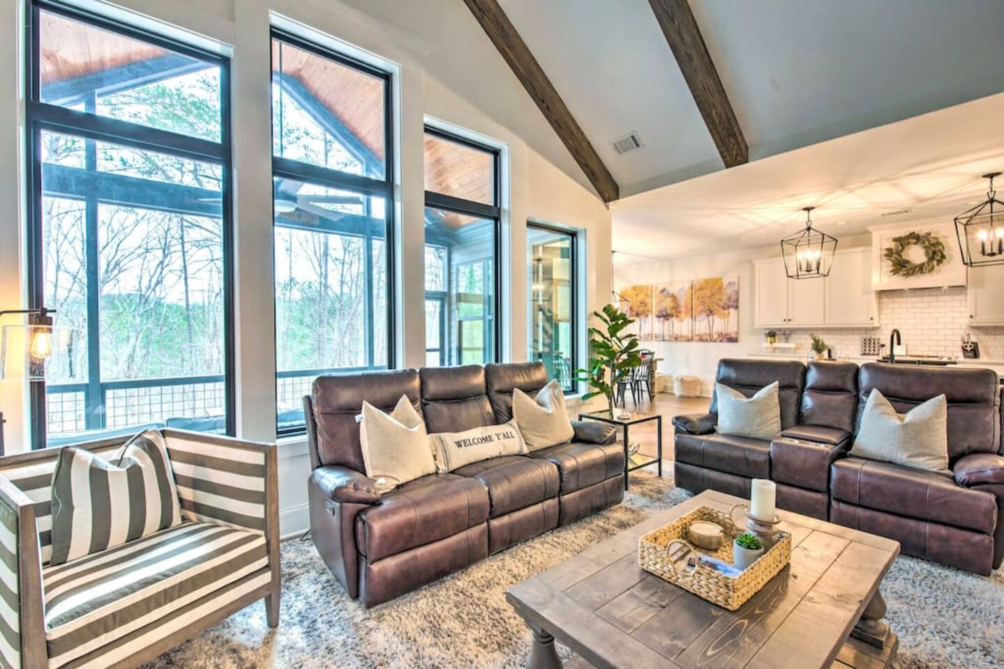 Living Area w/ Large windows looking into backyard