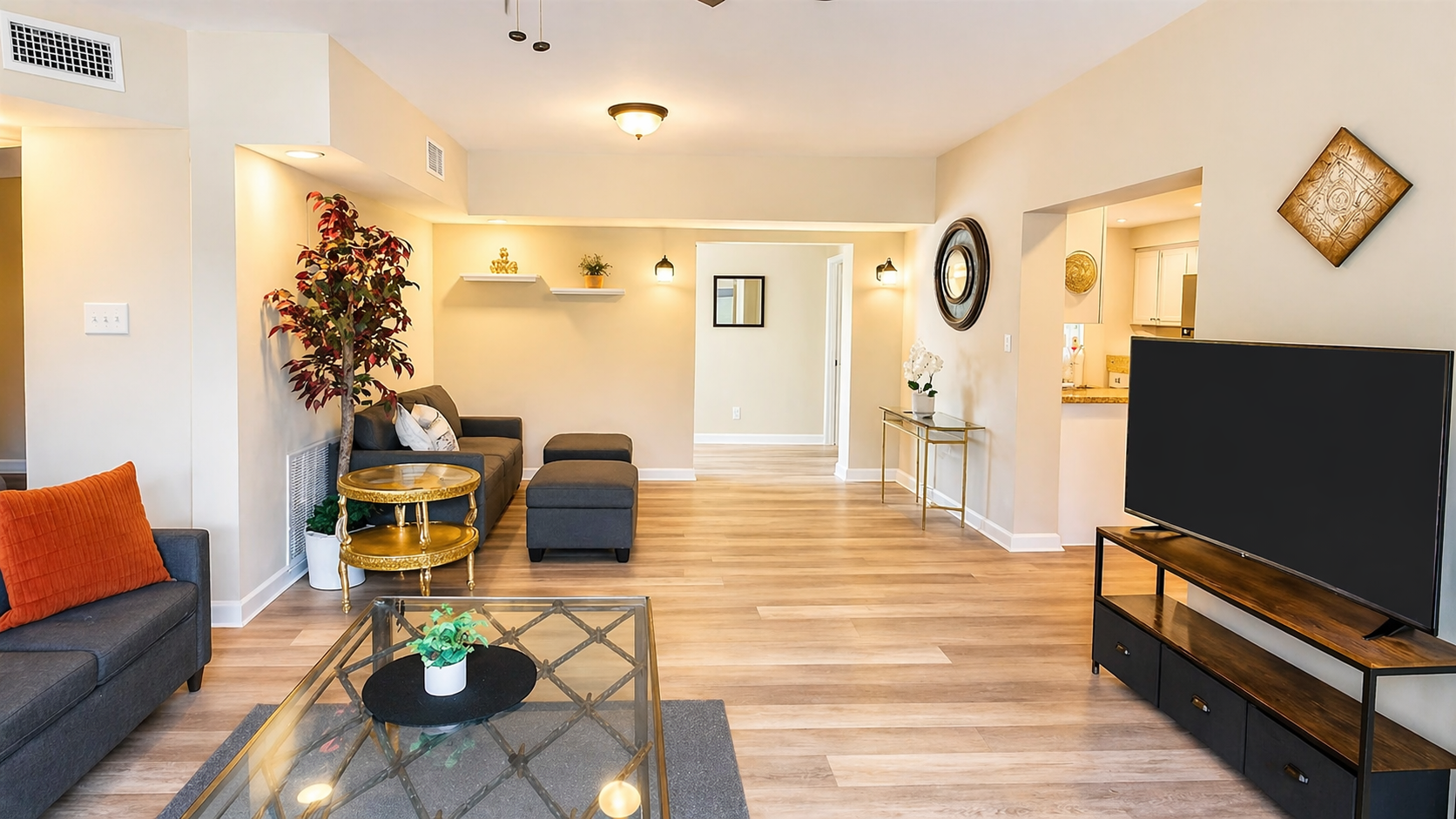 Living Room - Spacious open concept living area with comfortable seating and entertainment center