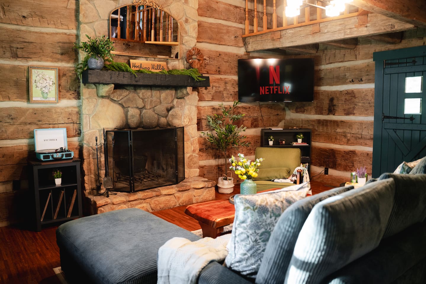 Cozy up by the fireplace to Netflix and and chill in the living room 