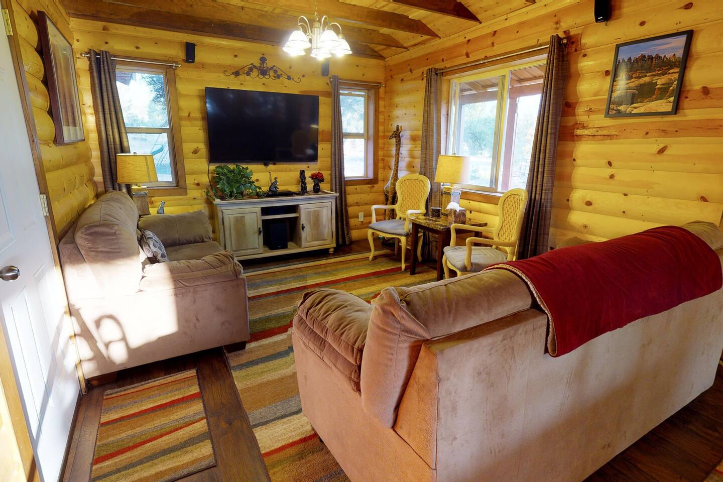 Relax and enjoy a movie in the living room.