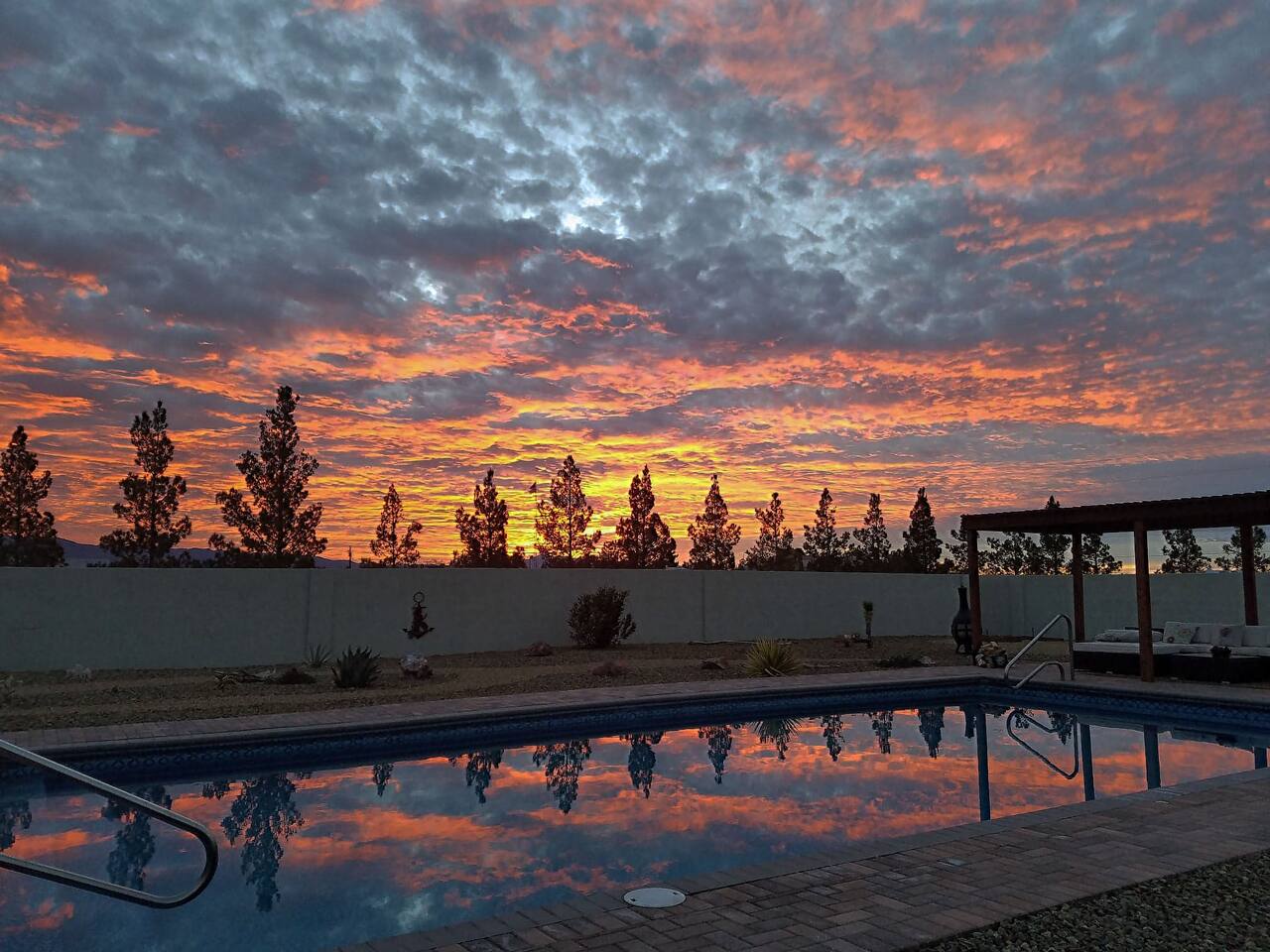 A gorgeous desert sunrise over the cottage.