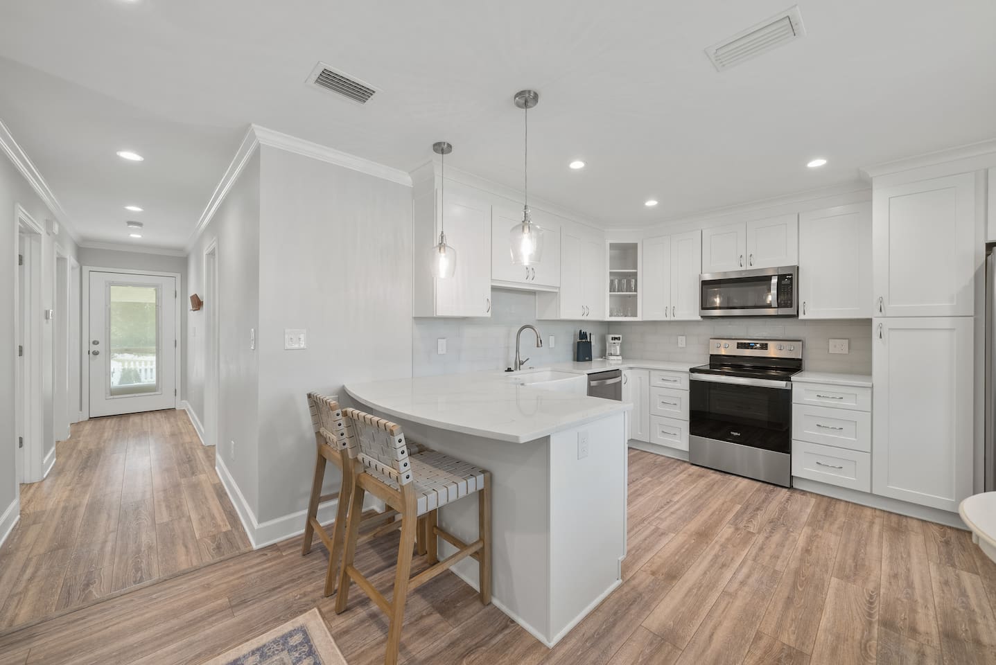 Open concept kitchen of Unit B. 