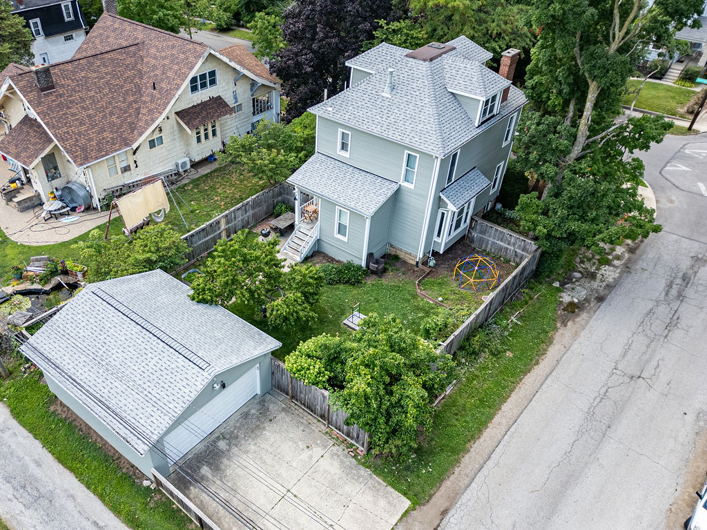 A parent's peace of mind! A bird's-eye view showing our fully enclosed, private backyard space where the kids can play safely.