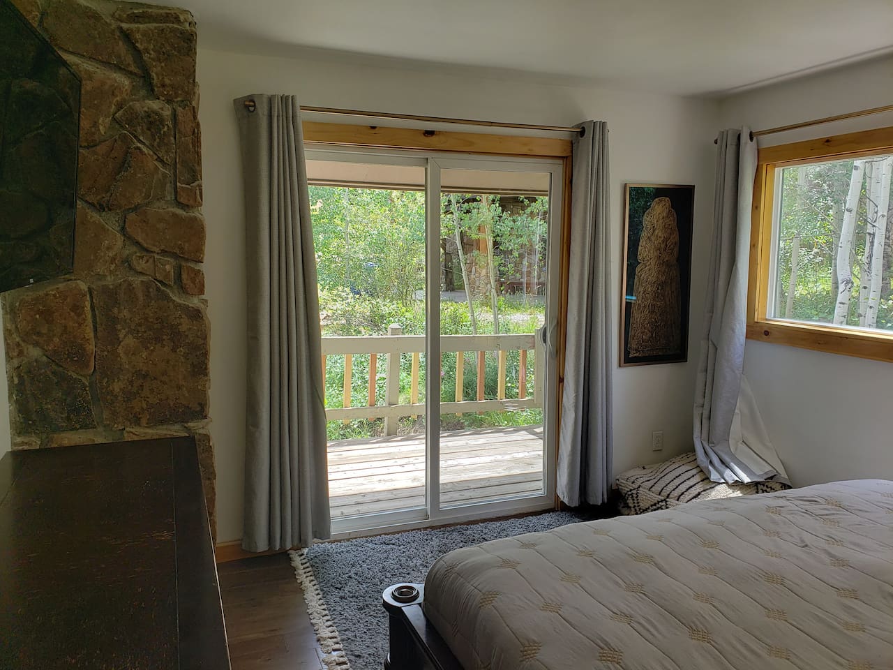 Bedroom 1 with walk out porch. 