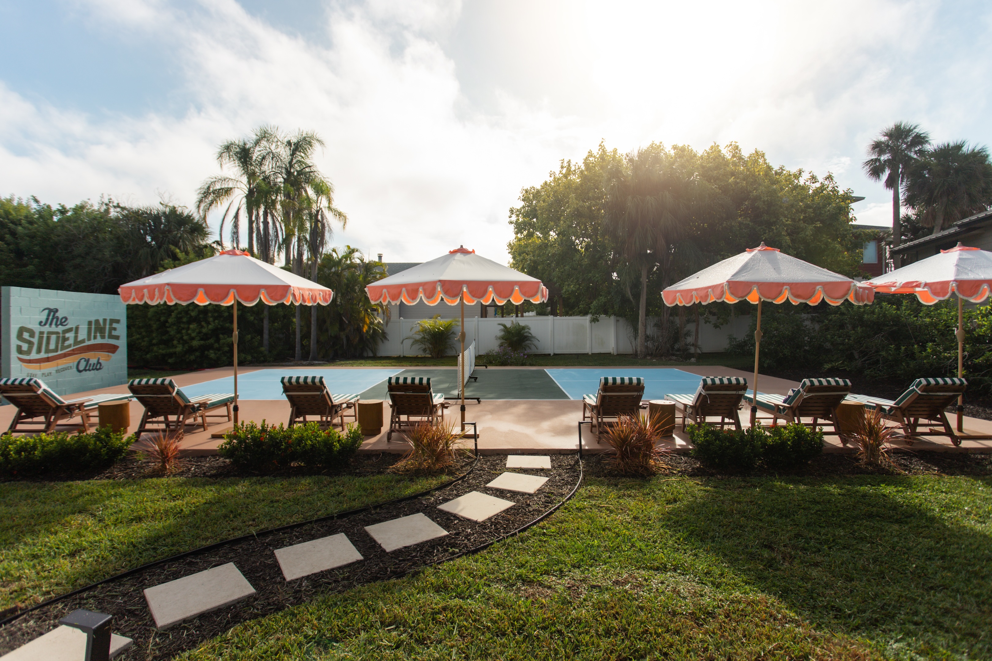 Play hard. Lounge Harder. Private pickleball court with 8-ft wall ball wall, shaded sideline loungers & throwback umbrellas. A sun-soaked space to rally, relax & recharge between games.