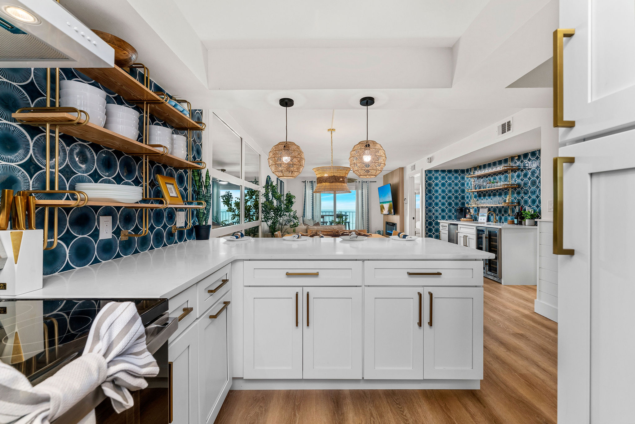 Bright lighting and spacious quartz counters make it easy to see exactly what you are chopping and prepping for dinner. You will find plenty of plates, bowls, and glassware in the cabinets, so you don't have to run the dishwasher after every single meal.