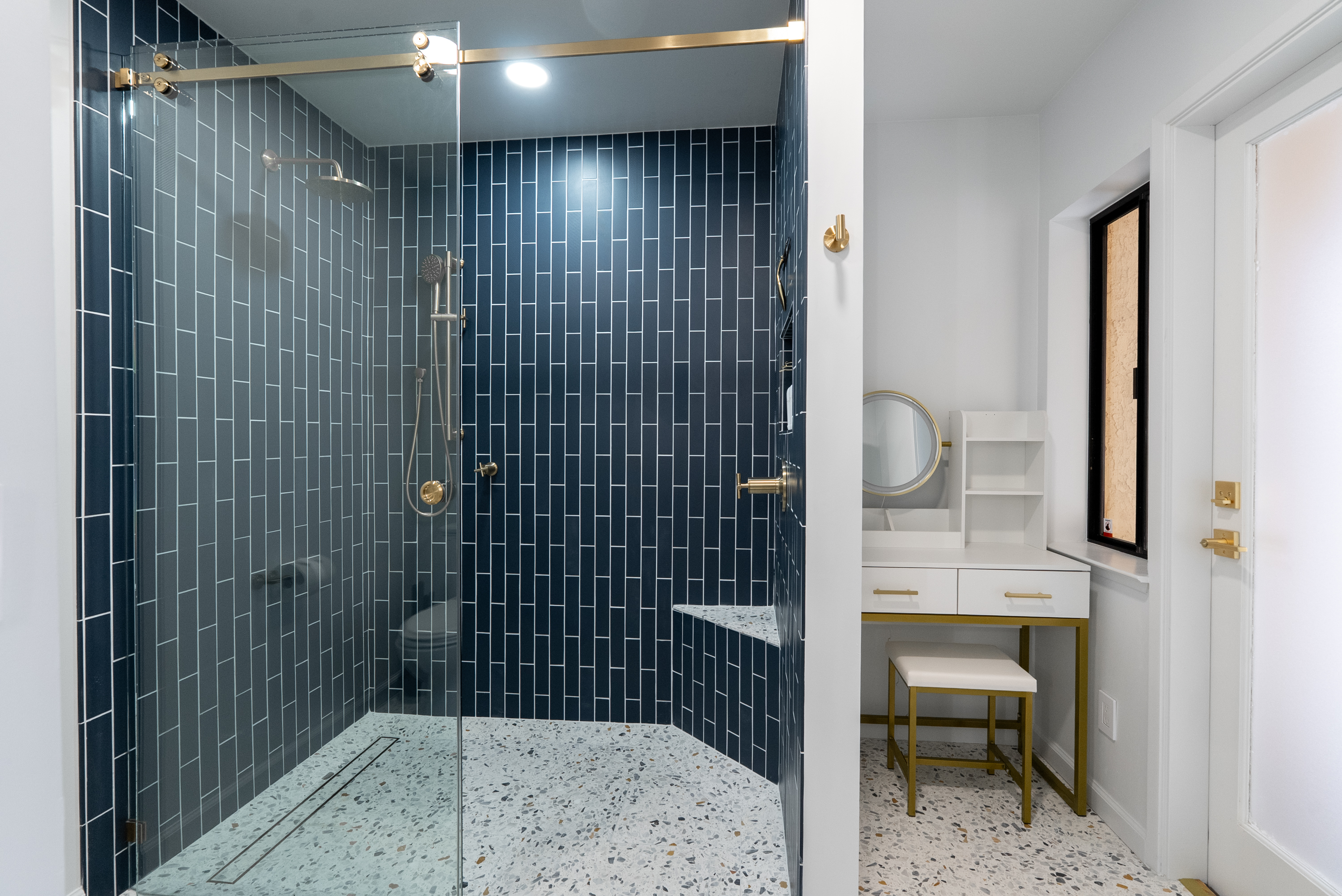 Mid Century Blue A serene blend of bold blue tones and sleek mid-century design, creating a timeless and tranquil bath experience.