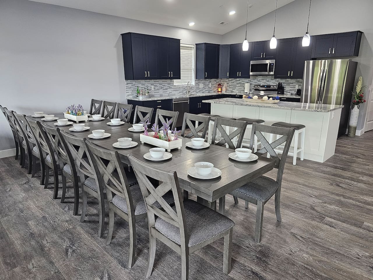 Spacious dining table ready for shared meals, celebrations, and memories.  Seating for 16.