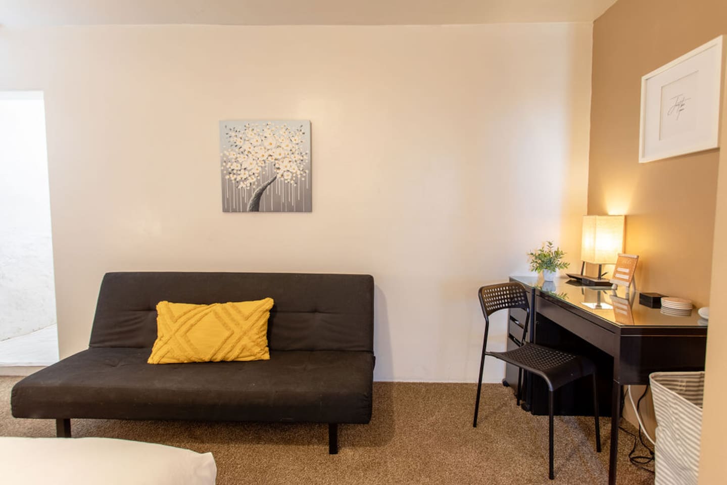 This futon is only 5'2" so please keep that in mind when you're booking! :)