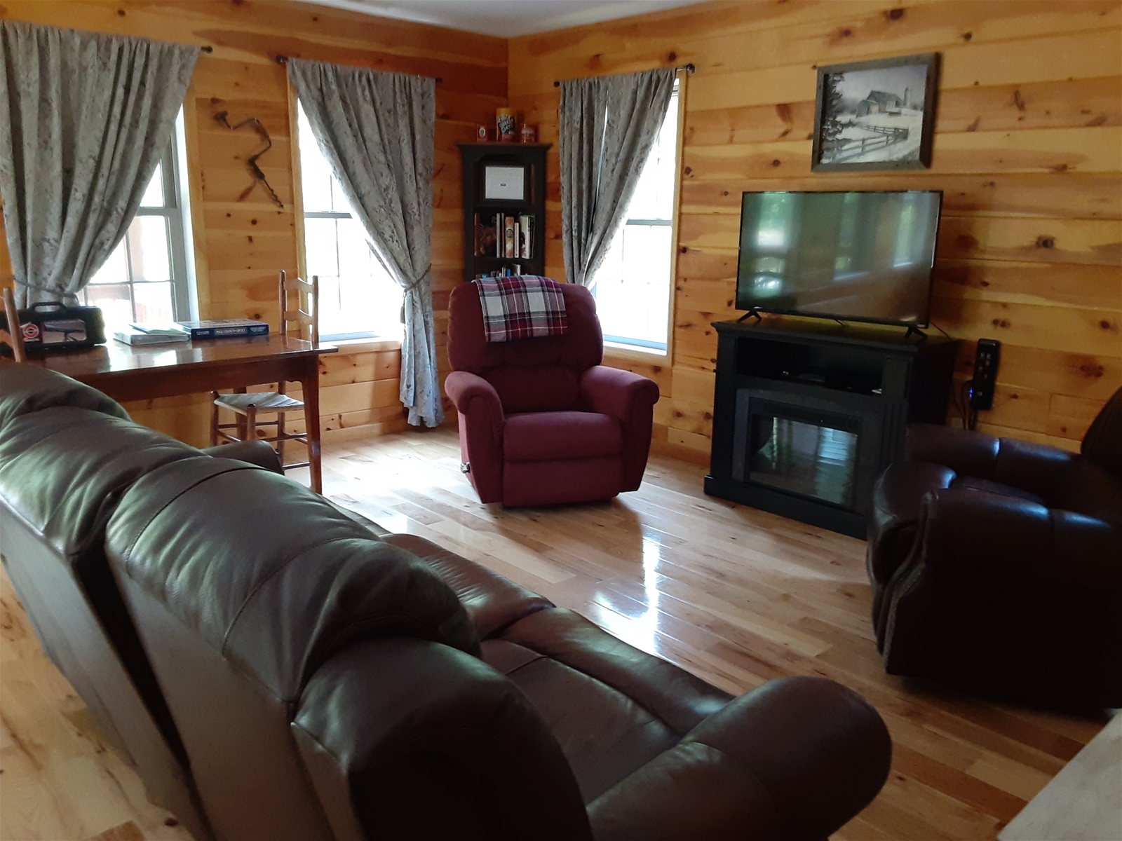 Comfortable seating provides plenty of space for your group to gather, whether you’re watching a movie, playing games, or simply unwinding by the soft glow of the evening.