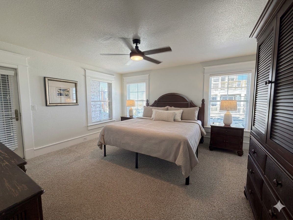 Bedroom 10 — Spacious King Suite with Warm Design & Natural Light | The Mark Twain Sleeps 40 Guests, Outer Banks