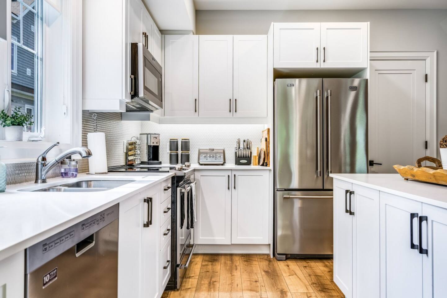 Modern appliances and thoughtful design make cooking together feel effortless.