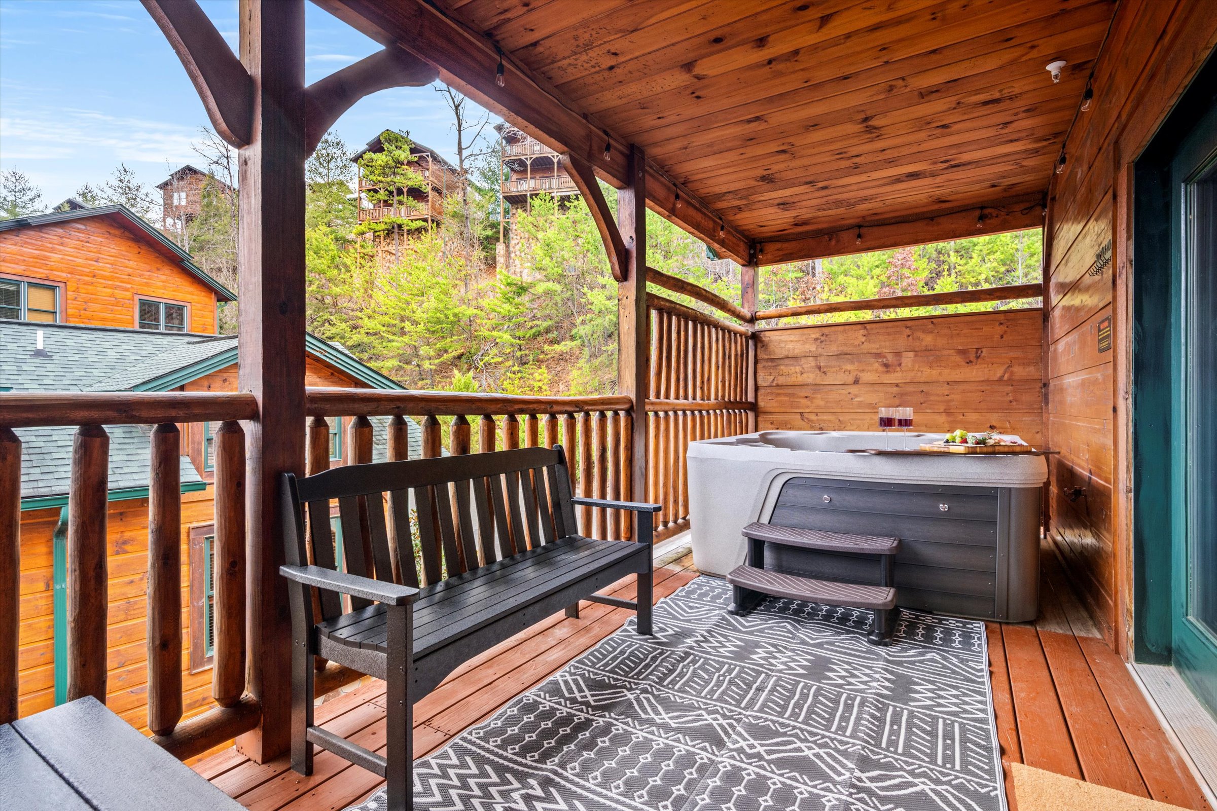 The hot tub on the upper floor can fit 7