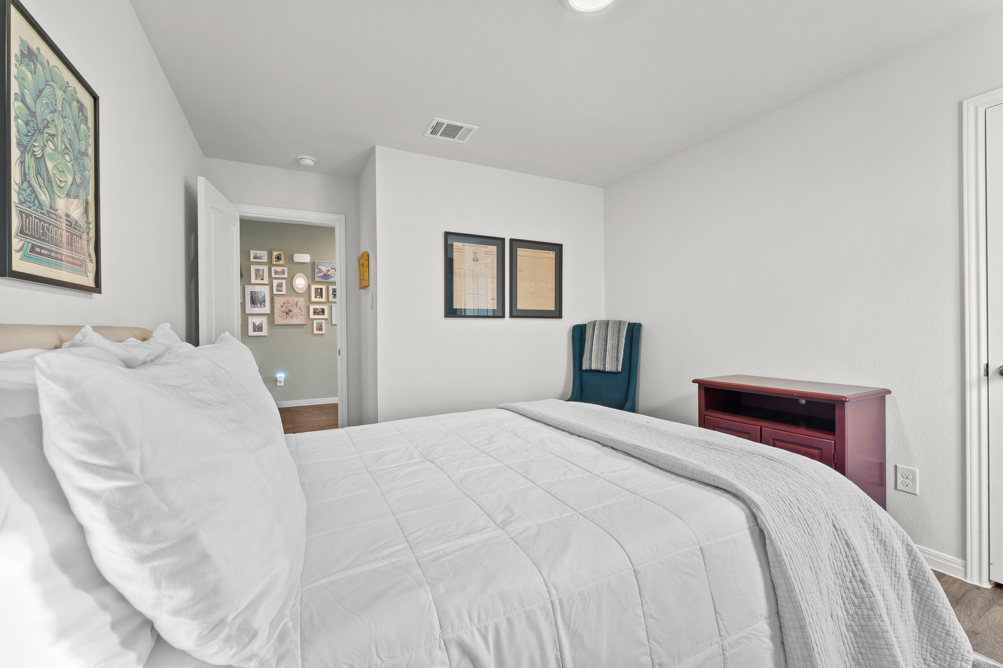 Bedroom 2 is just off the entry hall on the right and is a bright spacious room with closet