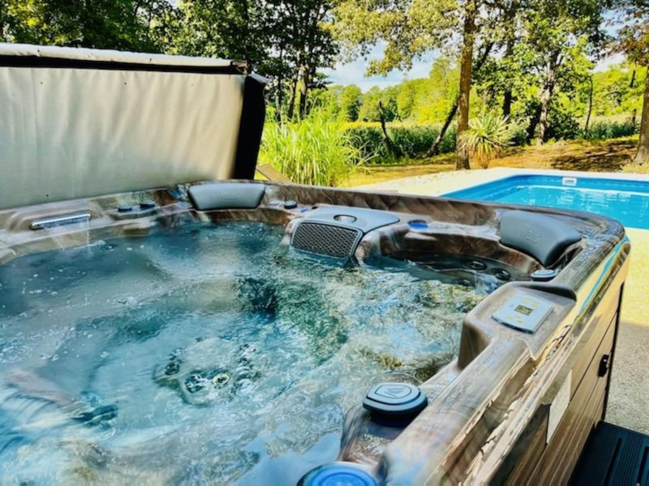 Hot Tub & Pool, just off the dining room patio door