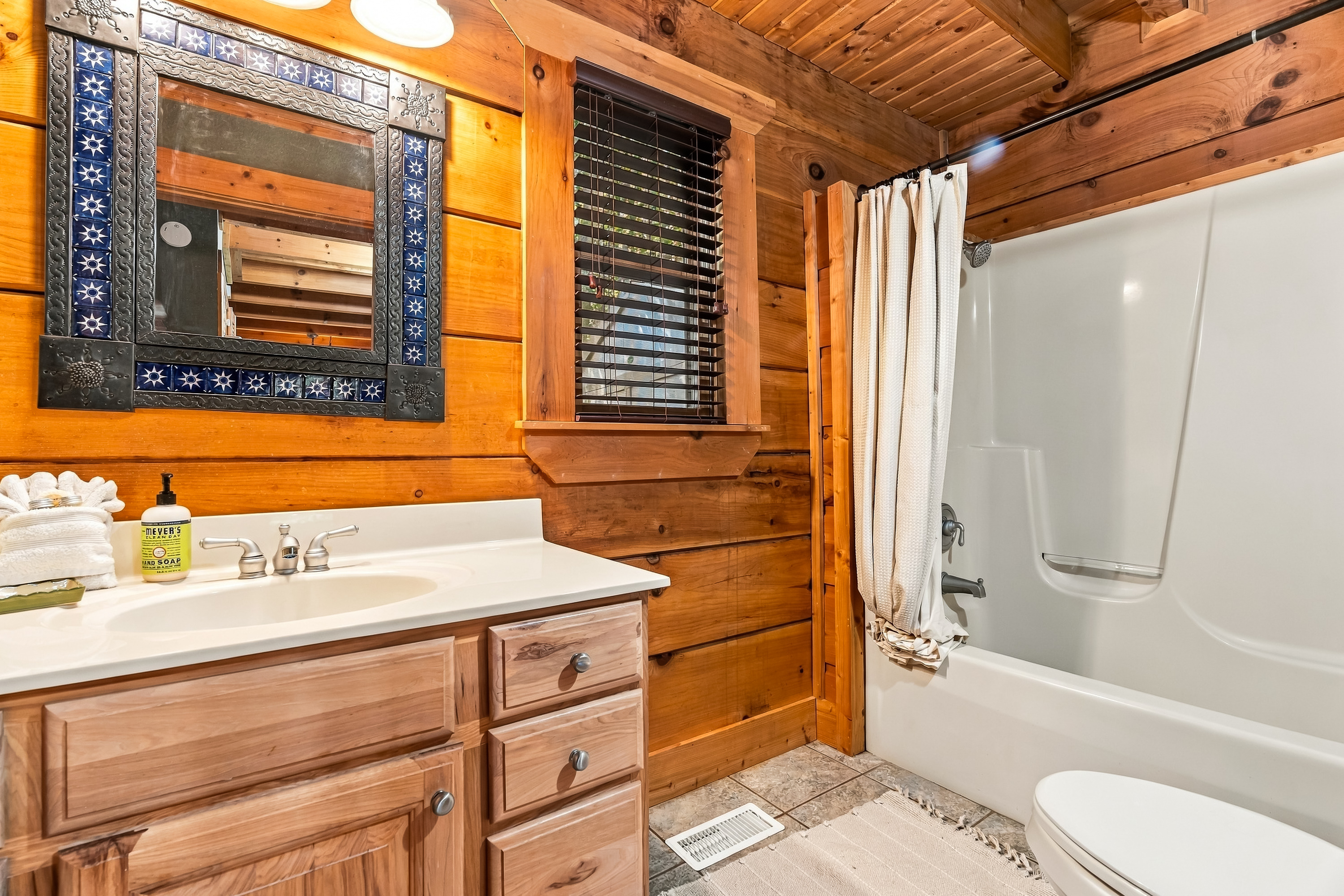 Main Level Bathroom with a Bathtub/Shower Combo