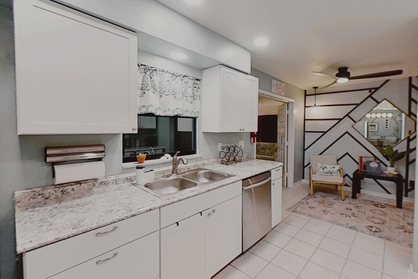 Kitchen, with double sink and dishwasher, dish detergent and dishwasher paks included.