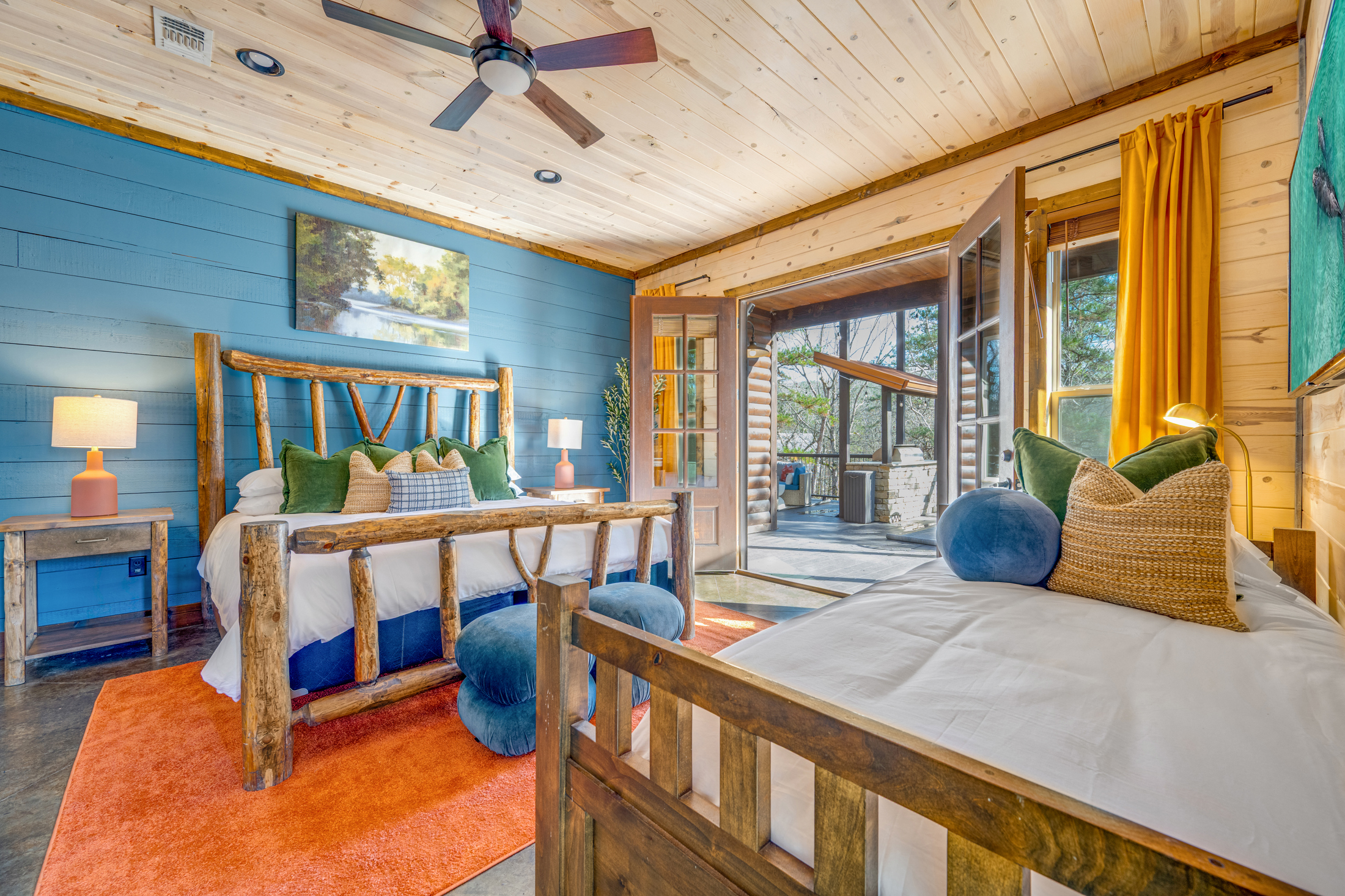 Spacious Bedroom Retreat: Rustic charm meets modern comfort with scenic views and vibrant decor!