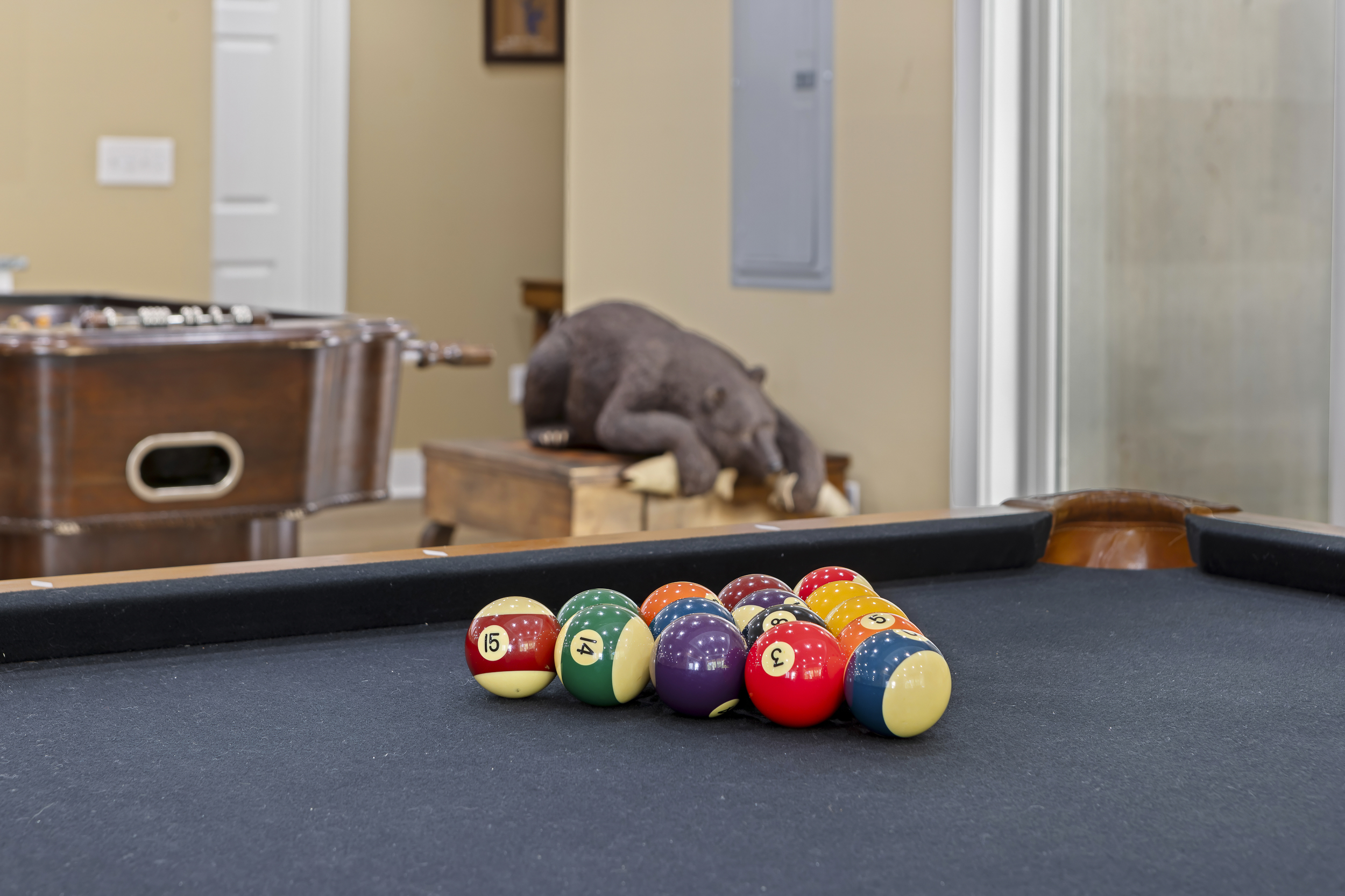 Game Room: Unleash your competitive spirit with pool and foosball in a vibrant setting!