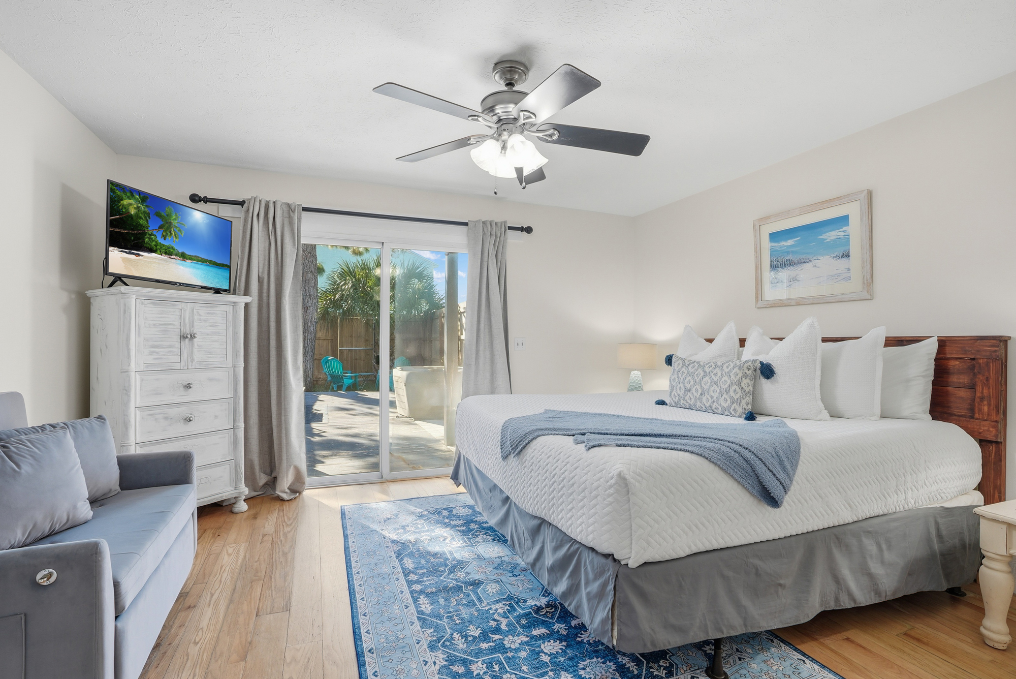 Bedroom # 2 is Downstairs with King Bed and Access to Backyard