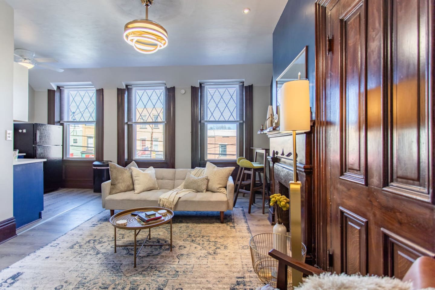 Living room with a cozy couch and a sleek center table, offering a perfect spot to relax and enjoy the view.