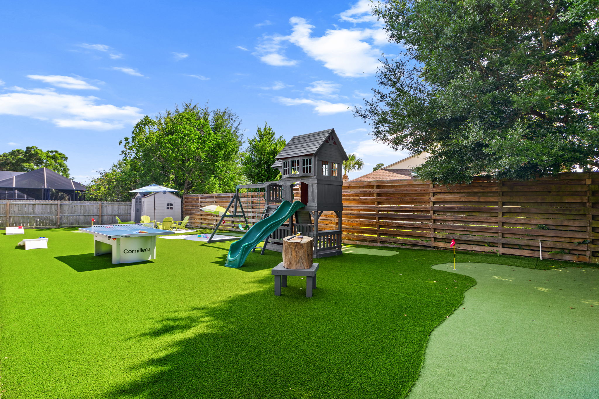 Stepping up to the tee at hole #1! Challenge your group to a mini-golf tournament on our private 3-hole putting green. We provide all the clubs and balls, making it easy for golfers of all ages to join in on the backyard fun.