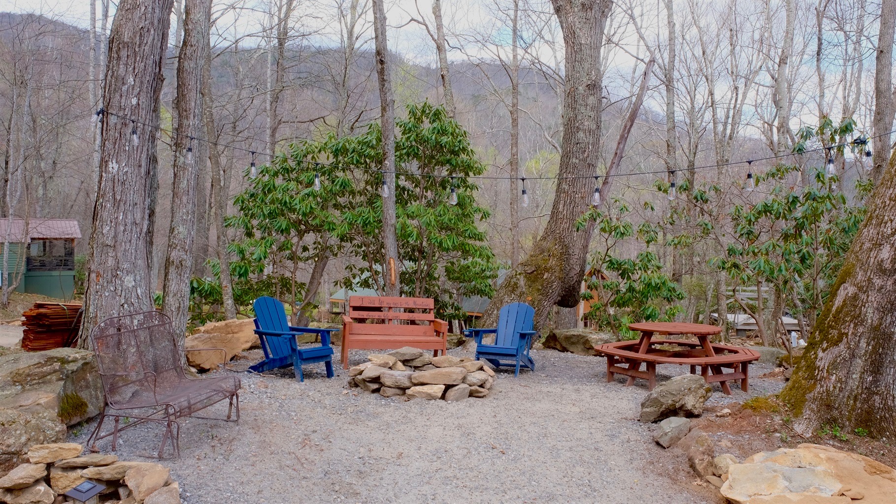 Community fire pit area is right outside your cabin