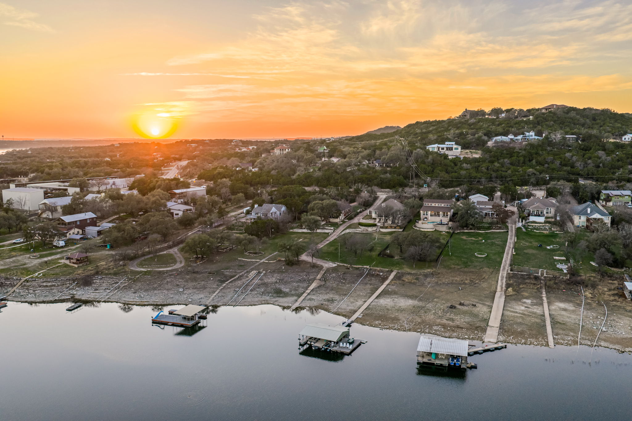 Stunning Hill Country sunset over the lake and surrounding neighborhood.