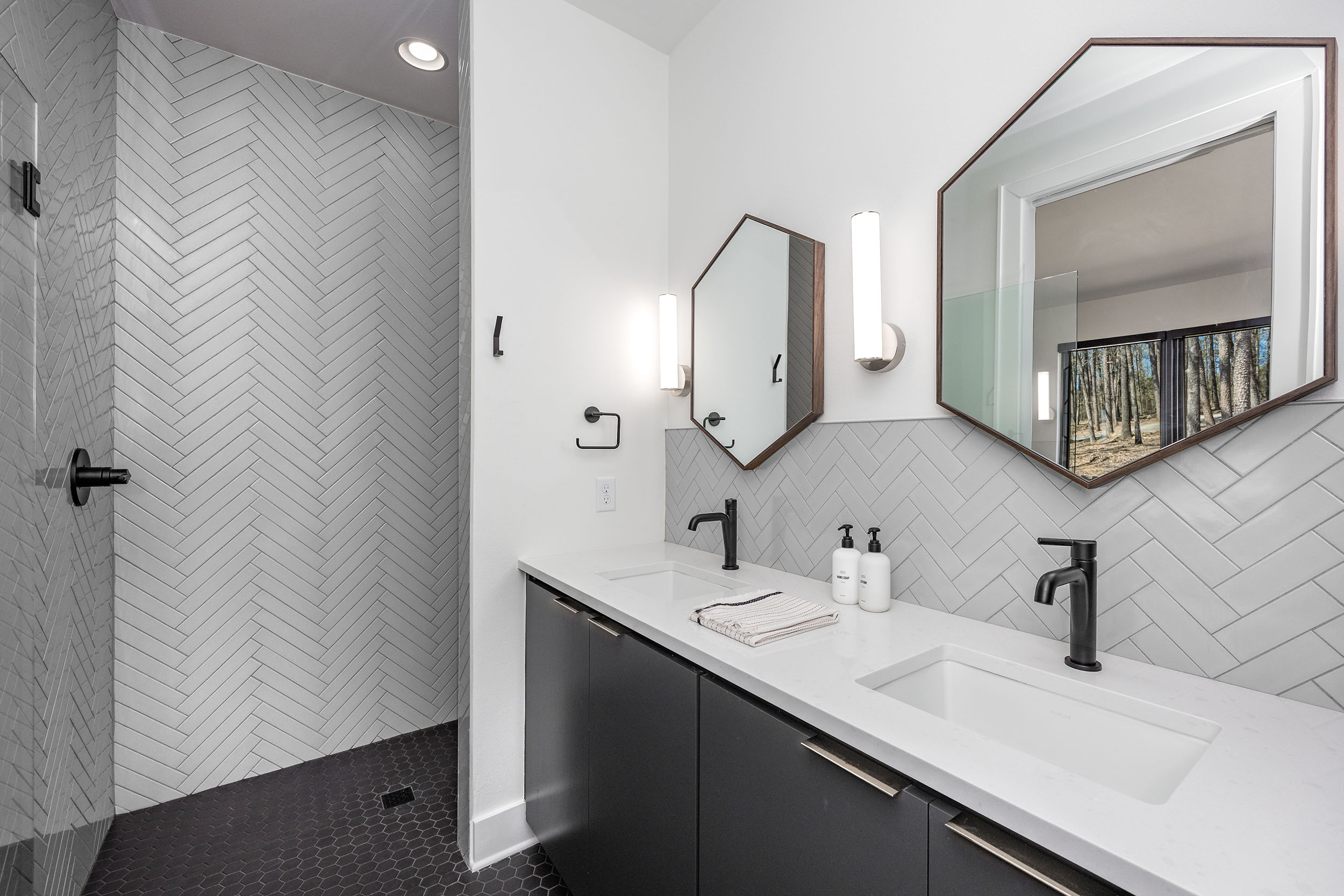 Each master bathroom has it's own design to fit the unique bedroom.