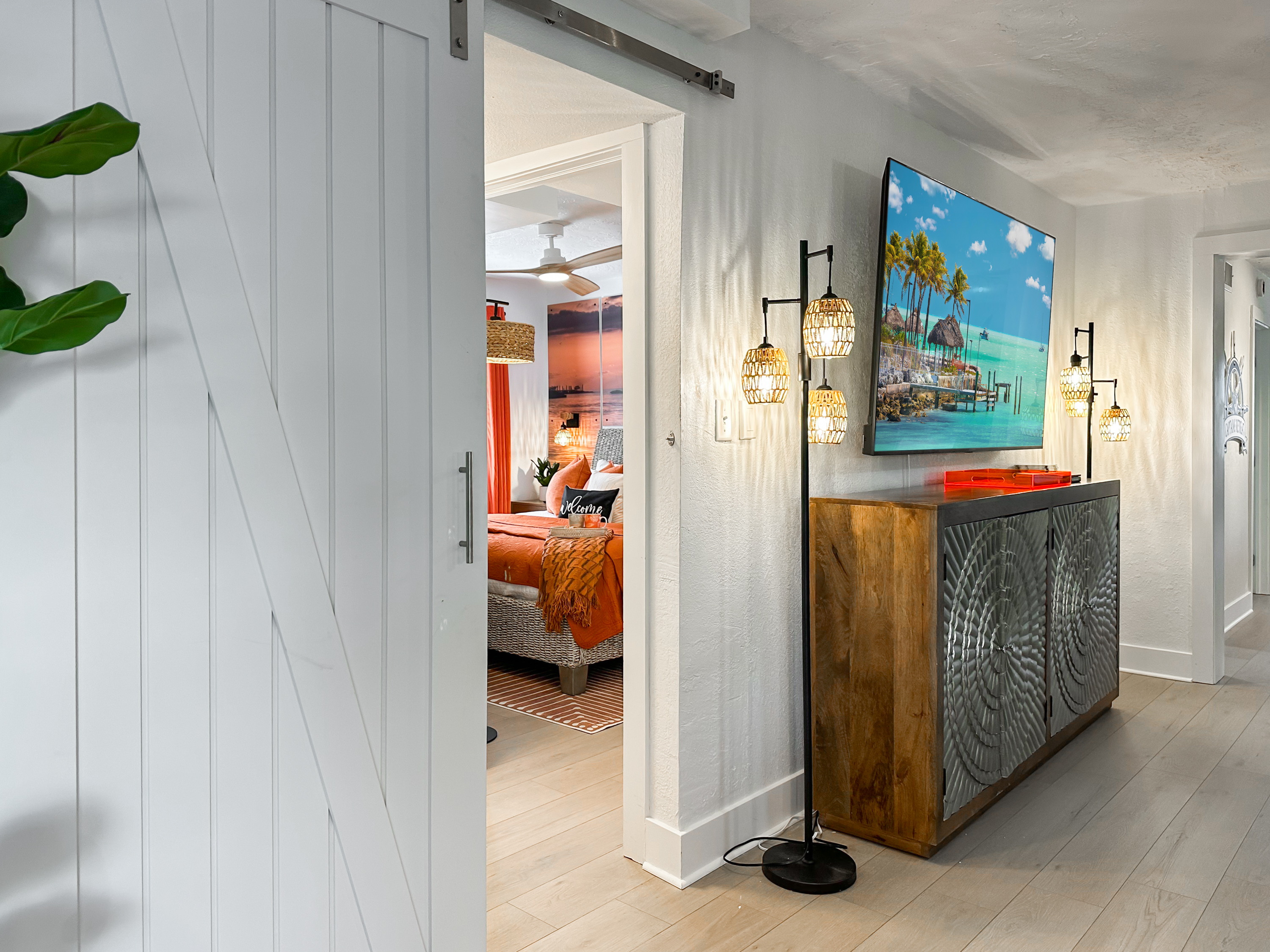 The second bedroom is bedding the living room barn doors.