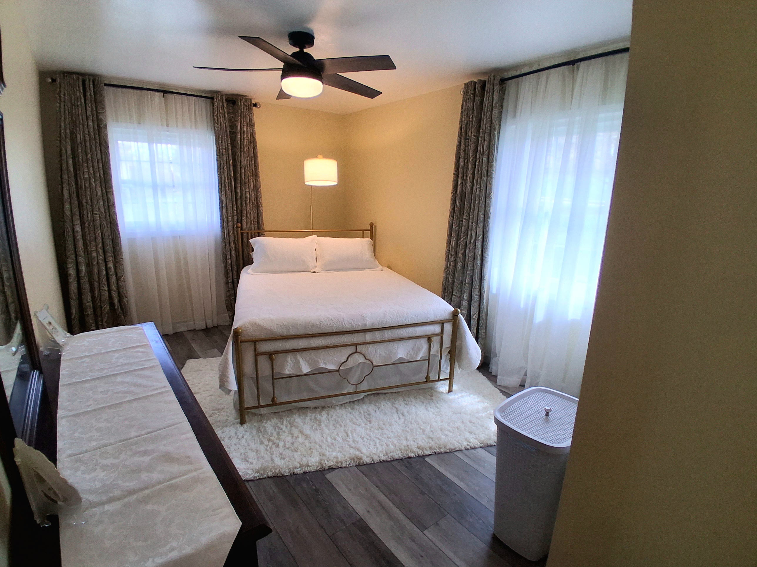 When the windows are open, a gentle country breeze fills the room.  It's so charming and peaceful, with lovely views and a quiet that invites relaxation. A remote-controlled fan and lamp help you set just the right mood.