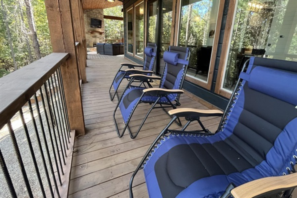 Sip, relax, and soak in the stunning forest views from the deck