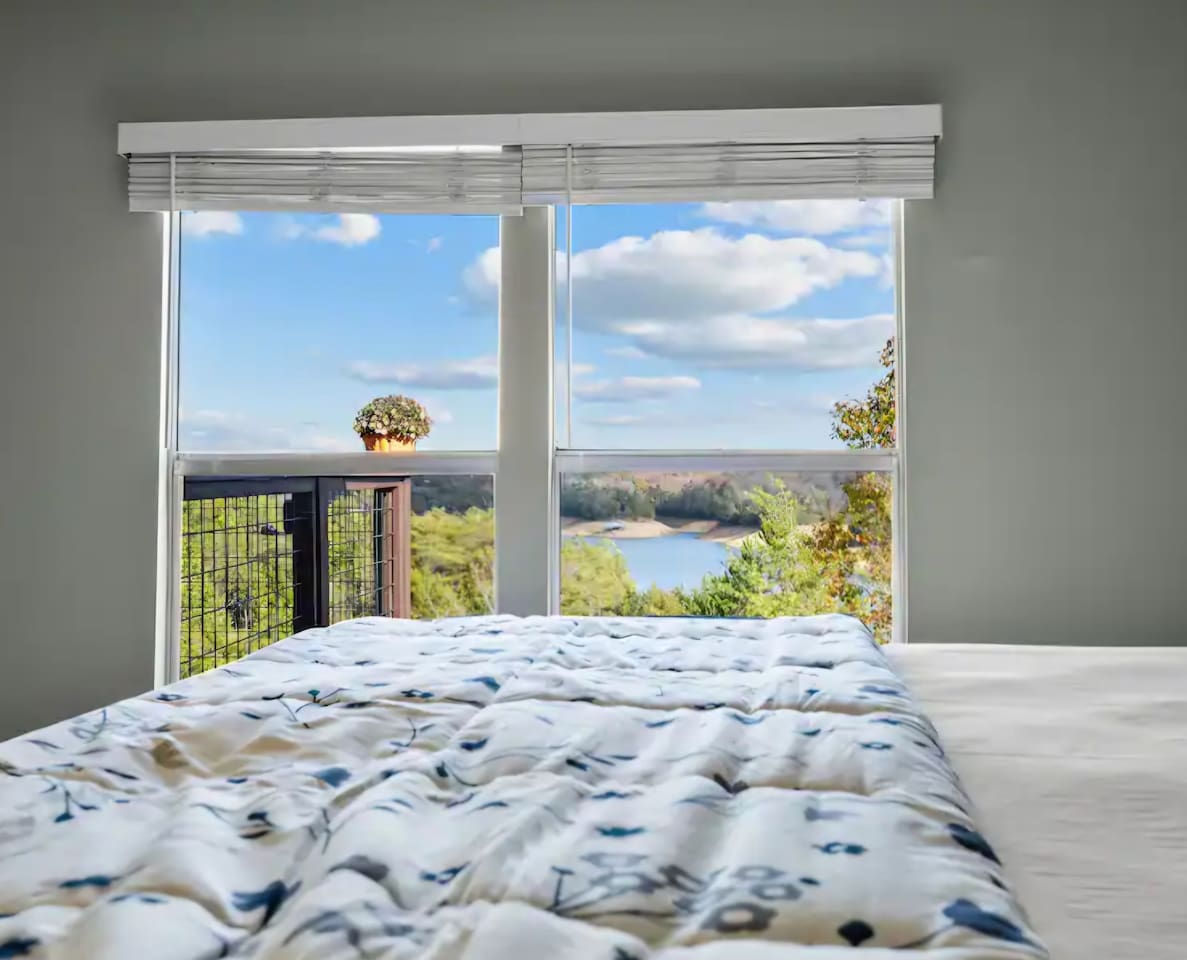 Wake up to a peaceful lake view right from the king bed. 