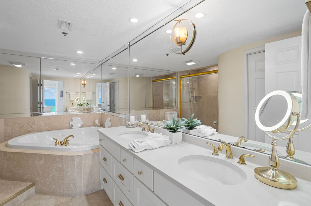 Spacious master bedroom features a King bed, Gulf views, balcony access, Smart TV w/ cable access, spacious bathroom with walk in shower + Soaker tub, and large closet.- NEW PHOTOS COMING SOON!