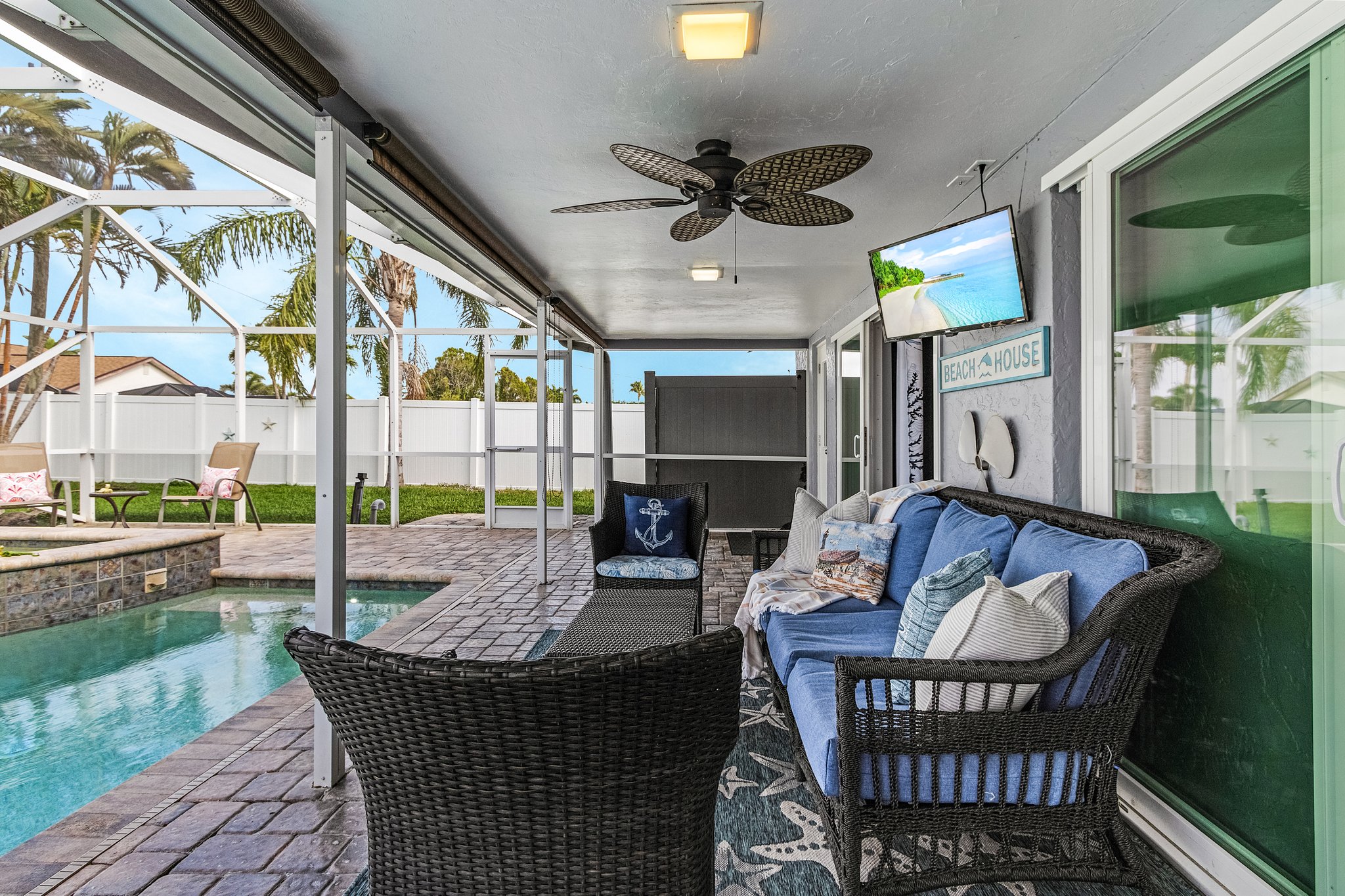 Catch the game or your favorite show poolside – comfy outdoor seating and a TV make this the ultimate relaxation zone!