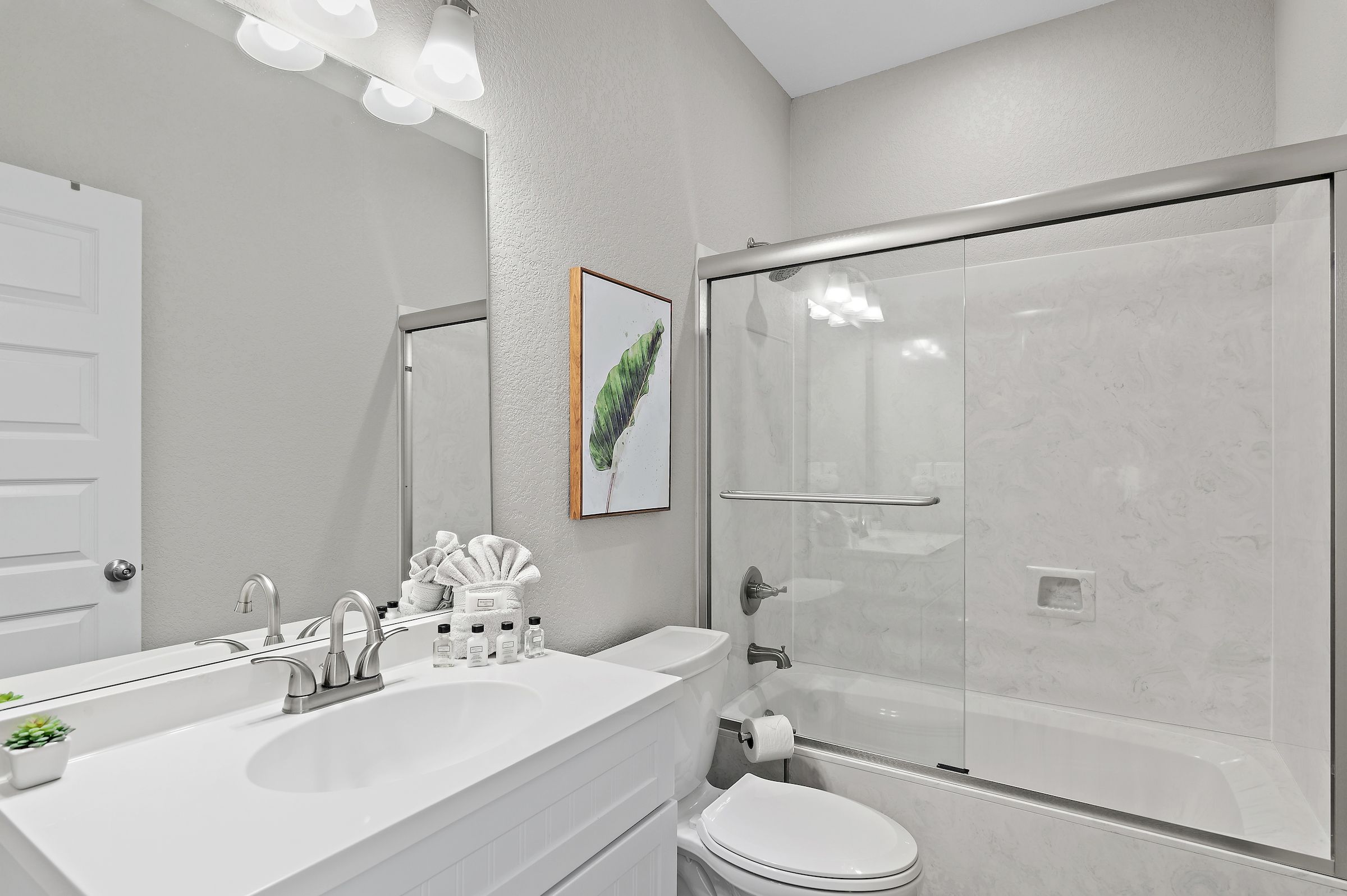 Bathroom #2: Private attached bathroom with shower/tub combo