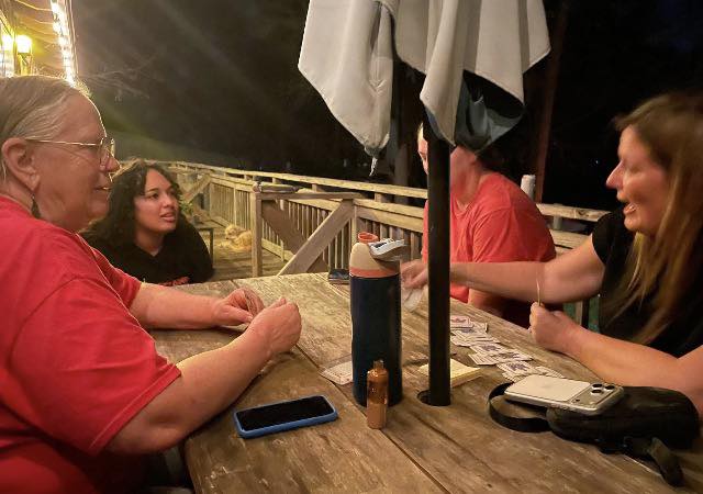 Tough game of spades on the upstairs deck!