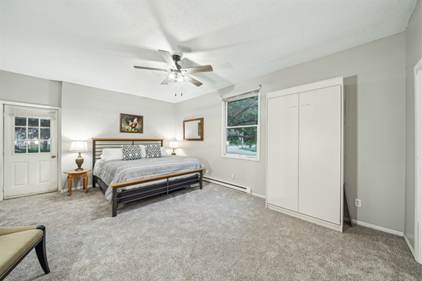 When not in use, the upper Murphy bed pops right back up and out of the way!