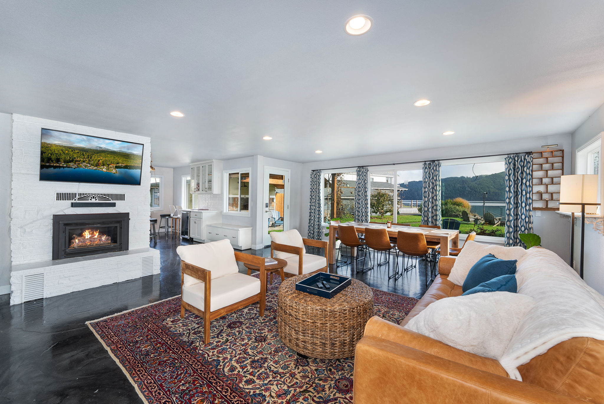 Get cozy in front of the fireplace and enjoy the heated concrete floors