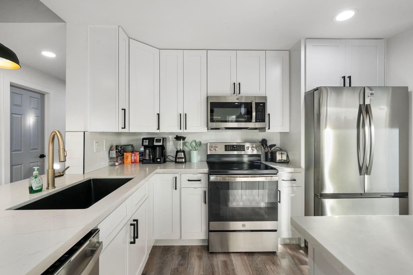 Thoughtfully appointed with premium appliances and ample counter space.