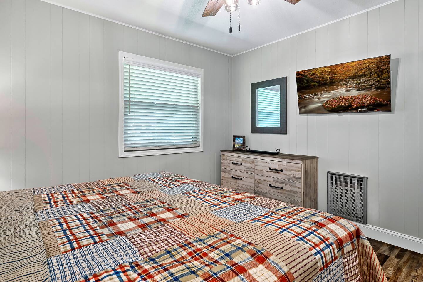 Recharge in the stylish second bedroom, complete with a luxurious king mattress and a smart HD TV, ensuring a great night's sleep for all. #SerenitySleep