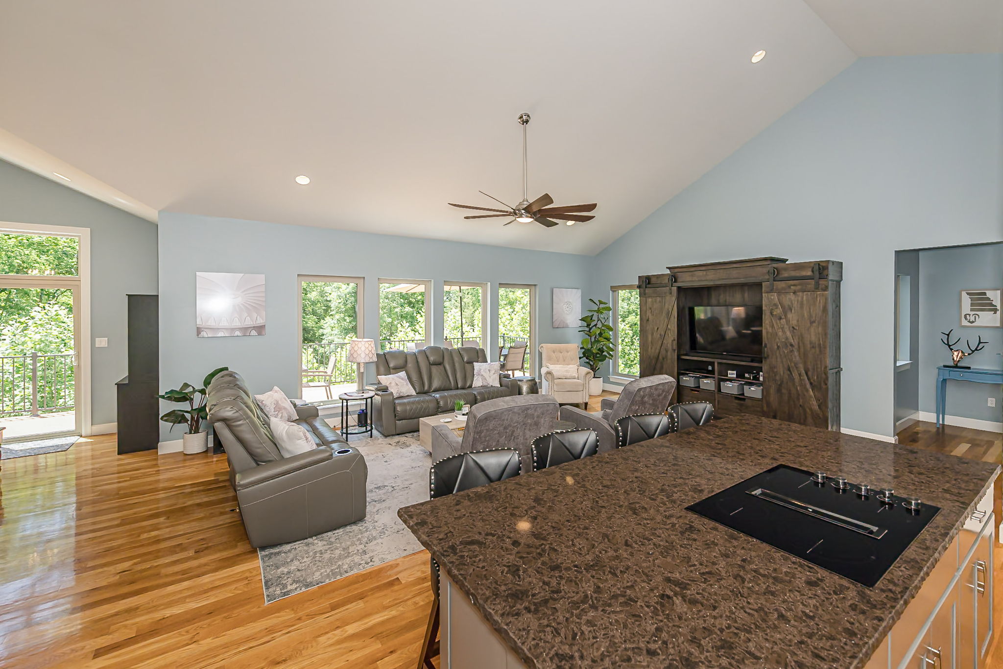 Enjoy peaceful wooded views from the kitchen island.