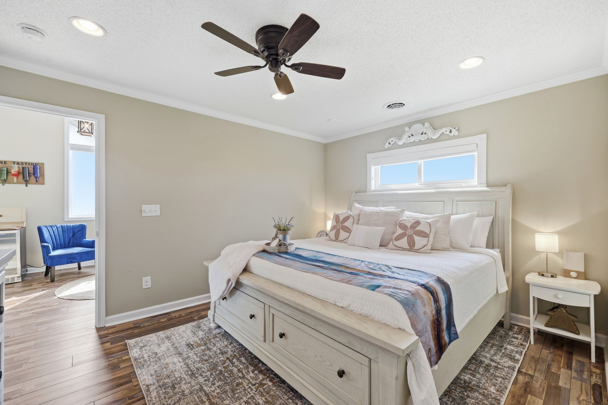 Enjoy peaceful nights in the comfortable king bed after unwinding with music and a glass of wine nearby.