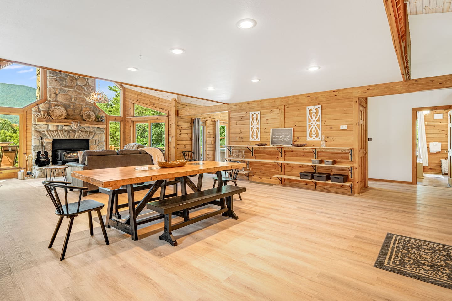 Share delicious meals in this inviting dining room, where wood accents and natural light create the perfect setting!